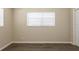 Bedroom with neutral walls, blinds, and wood-look flooring, offering a serene atmosphere at 4621 25Th S Ave, St Petersburg, FL 33711