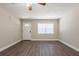 Spacious living room featuring new flooring, neutral walls, ample natural light, and a ceiling fan at 4621 25Th S Ave, St Petersburg, FL 33711