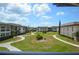 Aerial view of the complex showing the meticulously kept landscaping at 4826 Marine Pkwy # 202, New Port Richey, FL 34652