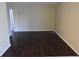 Hardwood floors, freshly painted walls, and open floor plan create an inviting living space at 4826 Marine Pkwy # 202, New Port Richey, FL 34652
