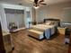 Comfortable bedroom with a cozy bed, soft lighting, and stylish decor, creating a relaxing retreat at 4666 Clarke St, North Port, FL 34286
