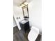 Bathroom with modern vanity and granite countertop at 10454 138Th St, Largo, FL 33774