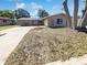 Charming single-story home with a well-manicured lawn and inviting curb appeal, ready for its new owners at 10454 138Th St, Largo, FL 33774