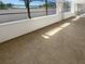 Bright sunroom featuring tile floor, large windows, and ample natural light at 10454 138Th St, Largo, FL 33774