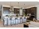 Beautiful kitchen with a large island, stainless steel appliances, and pendant lighting at 2726 Wise River Lane, Zephyrhills, FL 33539
