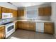 Traditional kitchen with ample counter space and classic appliances at 30406 Arrochar St, Wesley Chapel, FL 33545