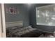 Bedroom featuring hardwood floors, light gray paint, and a window with blinds at 5125 Palm Springs Blvd # 13107, Tampa, FL 33647