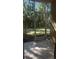 Enclosed patio offering a view of the lush backyard at 5125 Palm Springs Blvd # 13107, Tampa, FL 33647