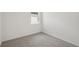 Cozy bedroom with carpet flooring and natural light at 14106 Crutchfield Ct, Parrish, FL 34219