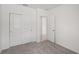 Simple bedroom with carpet flooring and a closet at 14106 Crutchfield Ct, Parrish, FL 34219