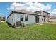 Well-maintained backyard with lush grass, perfect for outdoor activities and relaxation at 1839 Brekey Way, Zephyrhills, FL 33541