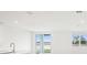 Bright living room with water view, modern kitchen and an open floor plan at 1870 Draughton Dr, Zephyrhills, FL 33541