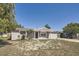 Charming single-story home featuring a covered entrance and brick walkway to the front door at 3206 Peterborough St, Holiday, FL 34690