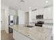 The modern kitchen offers stainless steel appliances, granite counters, and ample cabinet space at 3536 Moscato Dr, Brooksville, FL 34602