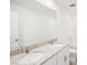 Elegant bathroom features a double sink vanity with granite countertop, shower and toilet at 437 Lazy Shore Dr, Nokomis, FL 34275