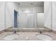 Bright bathroom featuring a double sink vanity with granite countertop at 437 Lazy Shore Dr, Nokomis, FL 34275