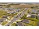 Aerial view of a planned community with lush landscaping and multiple lakes at 10008 Last Light Gln, Parrish, FL 34219