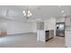 Bright kitchen featuring an island with stainless steel appliances and light cabinetry at 10008 Last Light Gln, Parrish, FL 34219