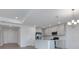 Modern kitchen with stainless steel appliances and center island at 10008 Last Light Gln, Parrish, FL 34219