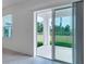 Sliding glass doors leading to patio and backyard at 10008 Last Light Gln, Parrish, FL 34219