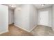 Inviting entryway with tile flooring and neutral paint, leading to carpeted areas at 2174 Brubeck Rd, North Port, FL 34287
