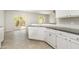 Functional kitchen with ample counter space and white appliances at 2174 Brubeck Rd, North Port, FL 34287