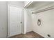 Laundry room with tile floor, storage shelves, and a utility sink hook up at 2174 Brubeck Rd, North Port, FL 34287