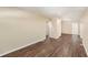 Spacious living room featuring new wood floors, neutral paint, and ample space at 626 Belleview Blvd, Clearwater, FL 33756