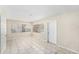 Light-filled living room boasts tiled floors and multiple windows for ample natural light at 626 Belleview Blvd, Clearwater, FL 33756