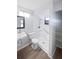 Bathroom featuring a walk-in shower, toilet, and vanity with a sink at 22162 Weeks Blvd, Land O Lakes, FL 34639