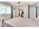 Comfortable bedroom featuring a bed and mirrored closet at 5208 30Th W St, Bradenton, FL 34207