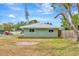 Charming home showcasing its exterior with well-maintained yard, perfect for enjoying the surrounding nature at 5208 30Th W St, Bradenton, FL 34207