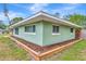 Well maintained exterior of this home is highlighted with a corner flower garden and clean white trim at 5208 30Th W St, Bradenton, FL 34207