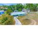 Charming single-story home boasts mature trees, long driveway, and a cozy front porch, exuding curb appeal at 5208 30Th W St, Bradenton, FL 34207