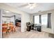 Bright home office connected to kitchen features gray walls and modern work setup at 5208 30Th W St, Bradenton, FL 34207