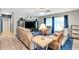 Spacious living room with a variety of seating options and an entertainment setup at 5208 30Th W St, Bradenton, FL 34207