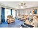 Inviting living room with plush seating, soft lighting, and ample natural light at 5208 30Th W St, Bradenton, FL 34207