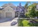 Charming two-story home featuring an attached garage and neatly landscaped front yard at 8035 St Simons St # 8035, University Park, FL 34201