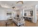 Bright living room seamlessly connected to a modern kitchen and stylish furnishings at 8035 St Simons St # 8035, University Park, FL 34201