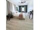 This bedroom has an accent wall, ceiling fan, and plush carpeting at 20003 Holly Lake Pl, Lutz, FL 33558