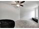 This cozy room features carpet and a beanbag chair at 20003 Holly Lake Pl, Lutz, FL 33558