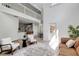 View of the main living area featuring two-story ceilings, hardwood floors, and an open floor plan at 20003 Holly Lake Pl, Lutz, FL 33558