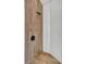 Stylish shower with white marble wall tiles and wood-look shower wall tiles at 20003 Holly Lake Pl, Lutz, FL 33558