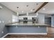 Modern kitchen with stainless steel appliances and granite countertops, perfect for cooking at 10237 Bannock St, Spring Hill, FL 34608