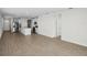 Bright, open-concept living space featuring stylish flooring and abundant natural light at 137 Whiteland Bnd, Nokomis, FL 34275