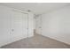 Comfortable bedroom featuring a closet with sliding doors at 13839 Richland Gulf Cir, Parrish, FL 34219