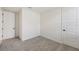 Bedroom featuring gray carpet and bright neutral paint at 13839 Richland Gulf Cir, Parrish, FL 34219