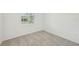 Cozy bedroom with plush carpeting and bright window at 13839 Richland Gulf Cir, Parrish, FL 34219