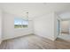 Bright dining room with backyard views and modern chandelier lighting at 13839 Richland Gulf Cir, Parrish, FL 34219