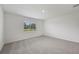 Bedroom featuring neutral carpeting, a window, and light walls at 14035 Kelly Park Ct, Parrish, FL 34219